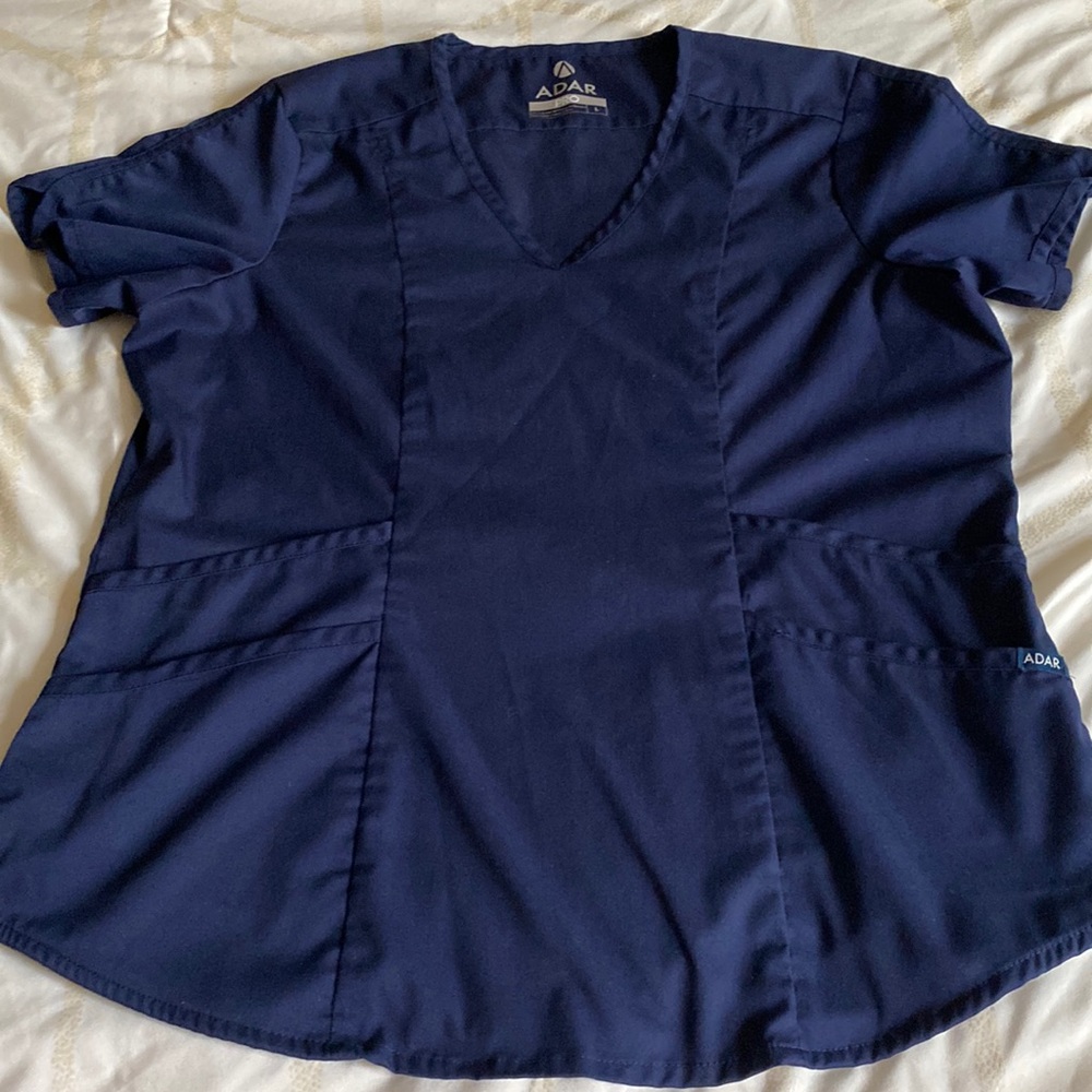 Navy Blue scrub suit.